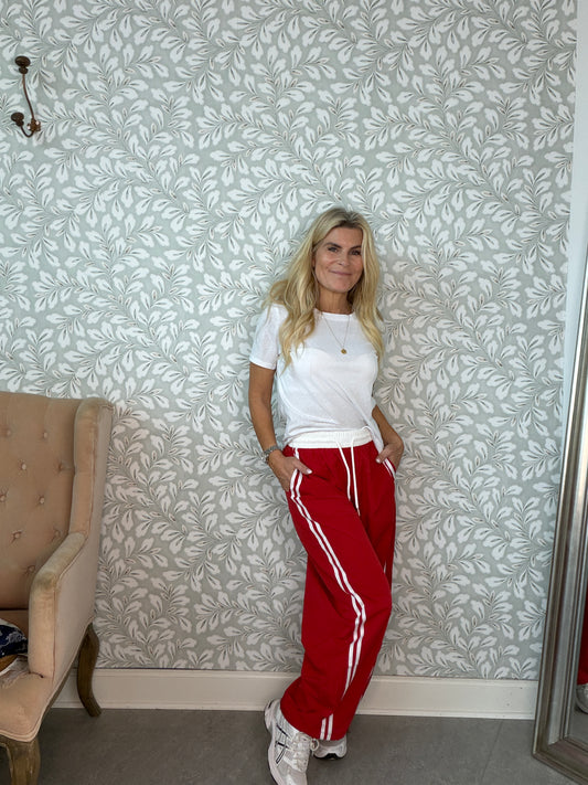 Track pants red