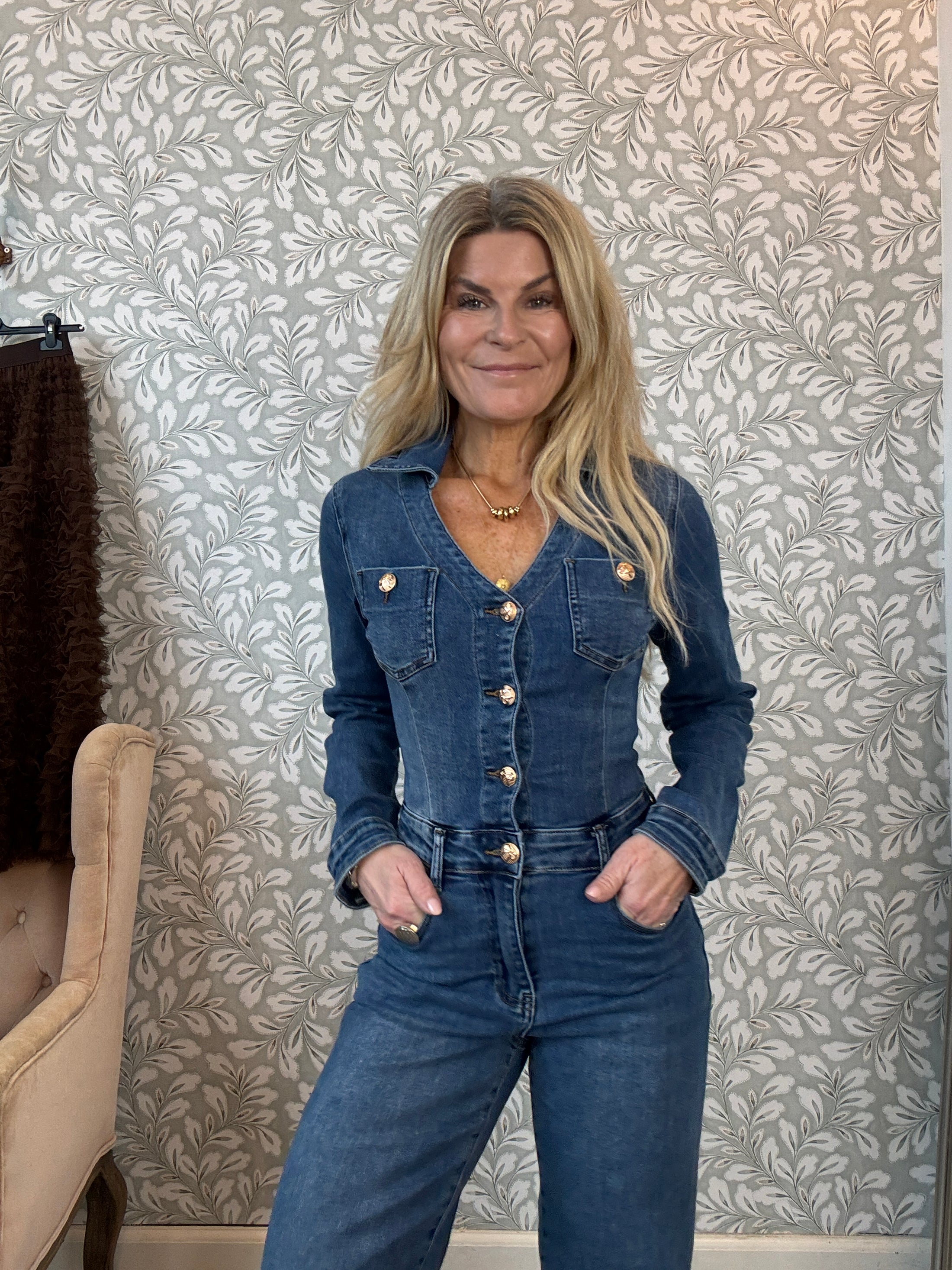 Denim jumpsuit with gold buttons