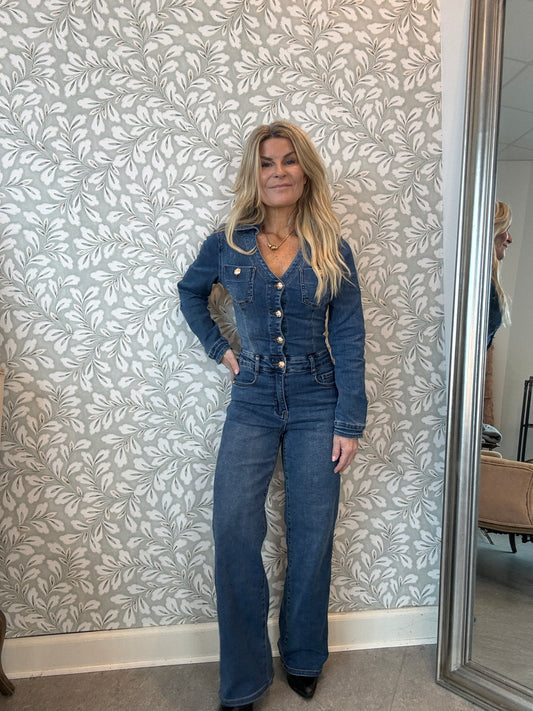 Denim jumpsuit with gold buttons